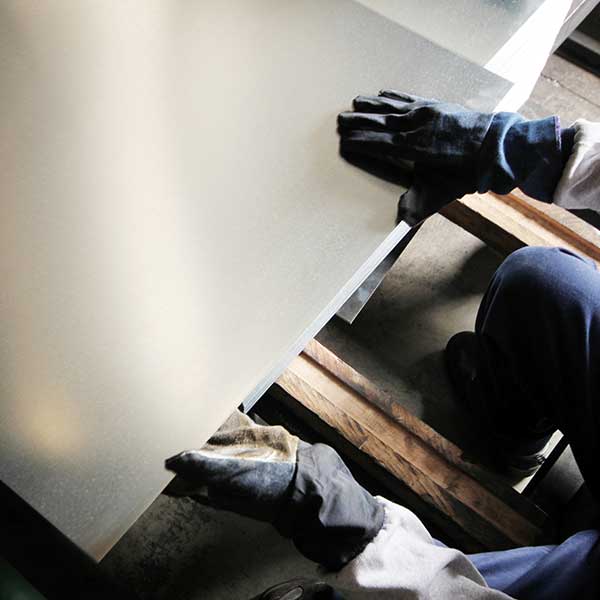 Worker working in metal cutting